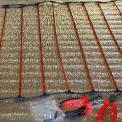 Läggning av kolfiber golvvärme för brickor och laminat
